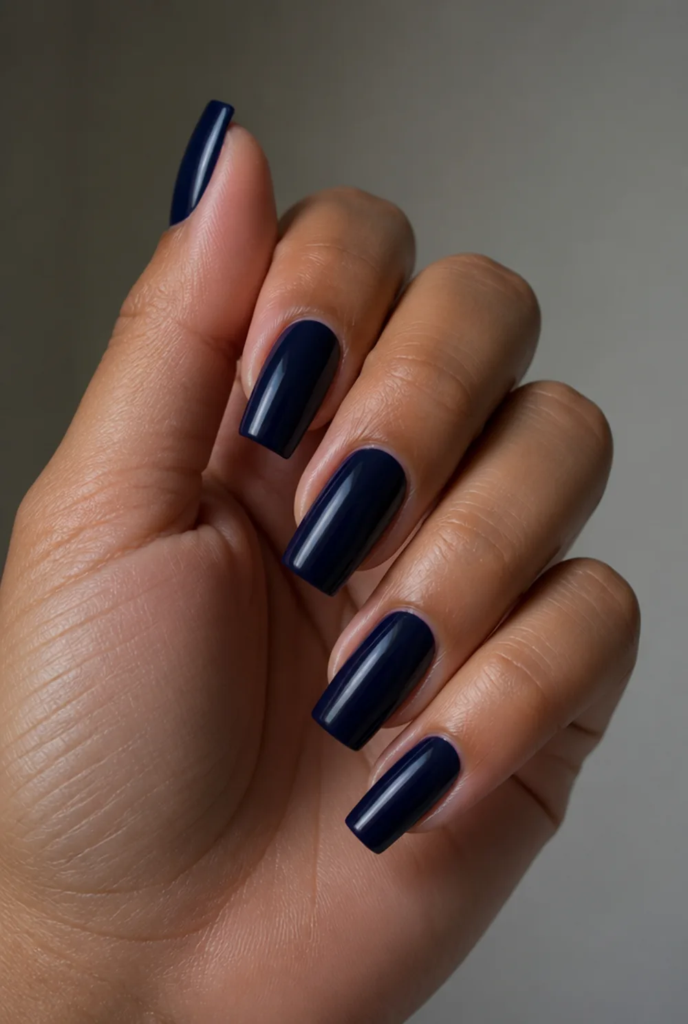 midnight navy nail art on olive skin, long length
