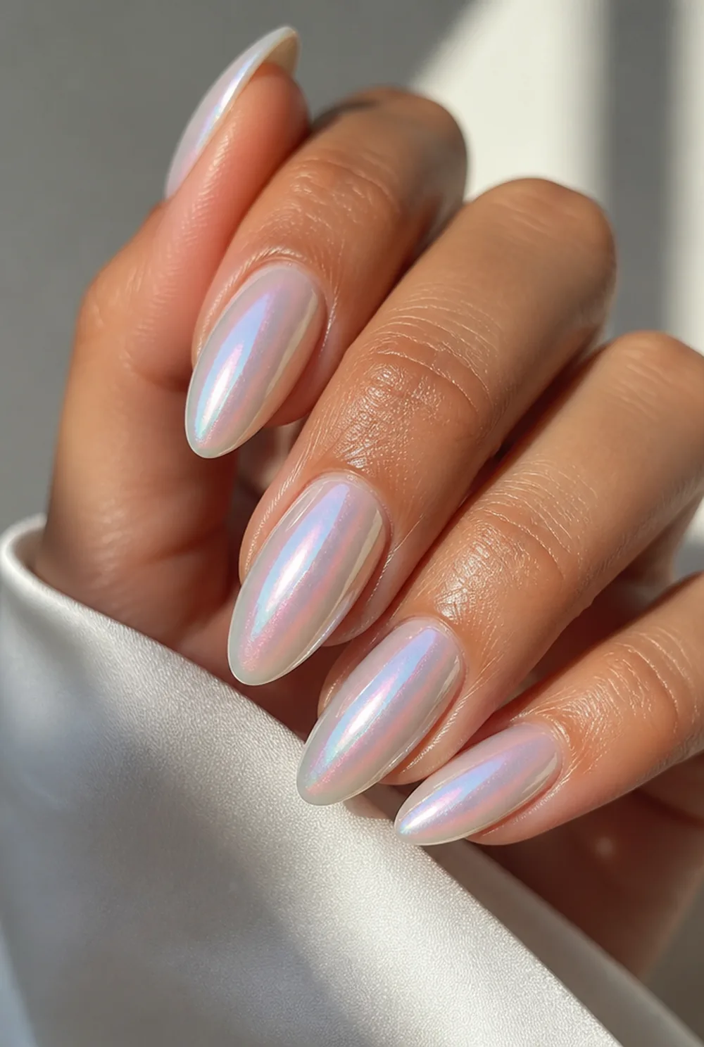 pearl glaze nail art on olive skin, long length