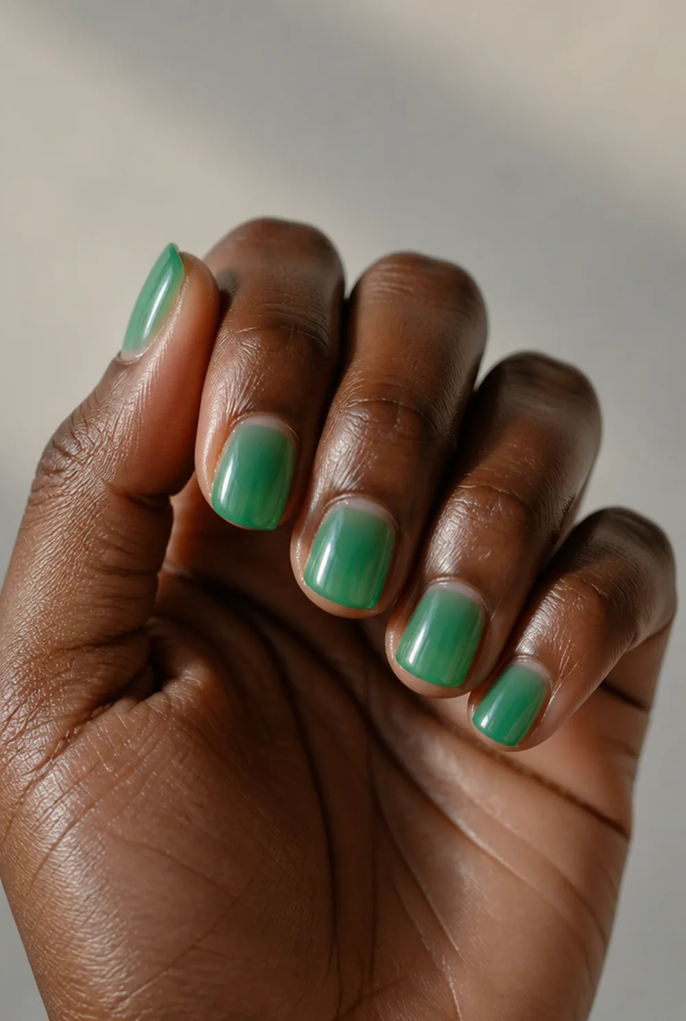sheer emerald jelly nail art on deep brown skin - PolishedAndPrettyNails.com sheer emerald jelly nail art on deep brown skin