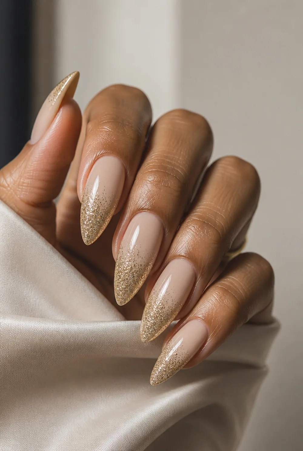 champagne glitter ombre nail art on olive skin, long length