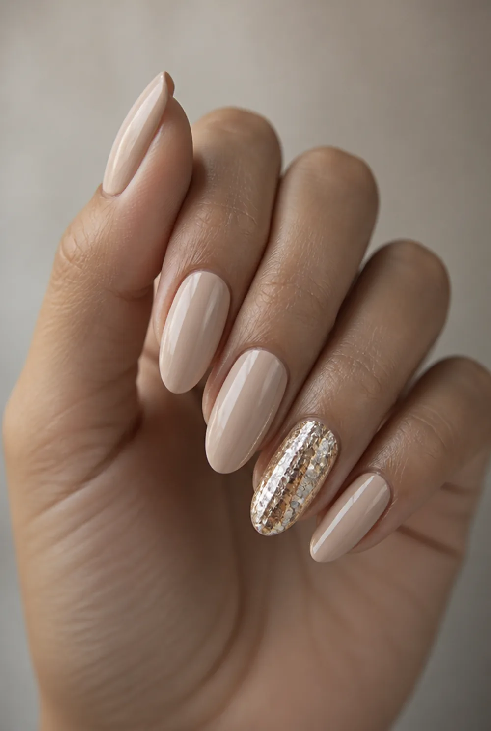 gold glitter accent nail nail art on olive skin, long length
