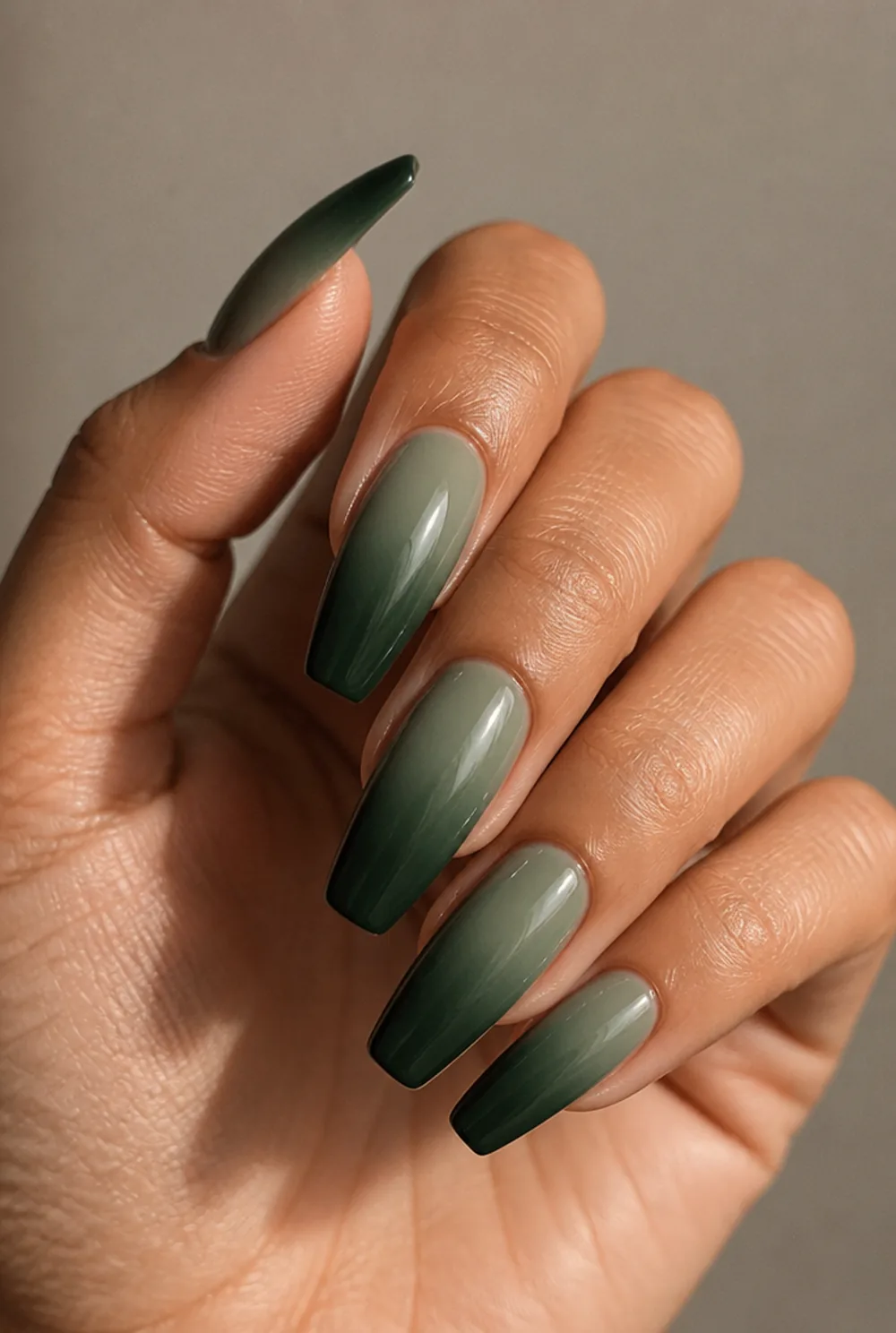green ombre nail art on olive skin, long length