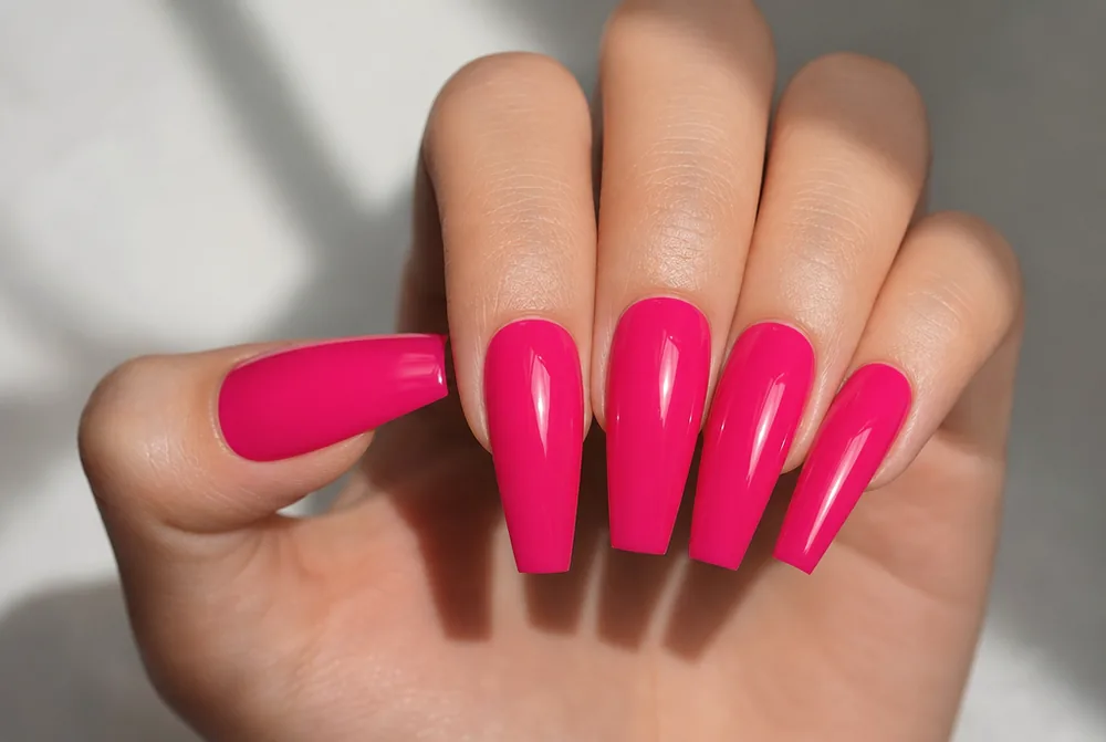 hot pink coffin nails with glossy finish