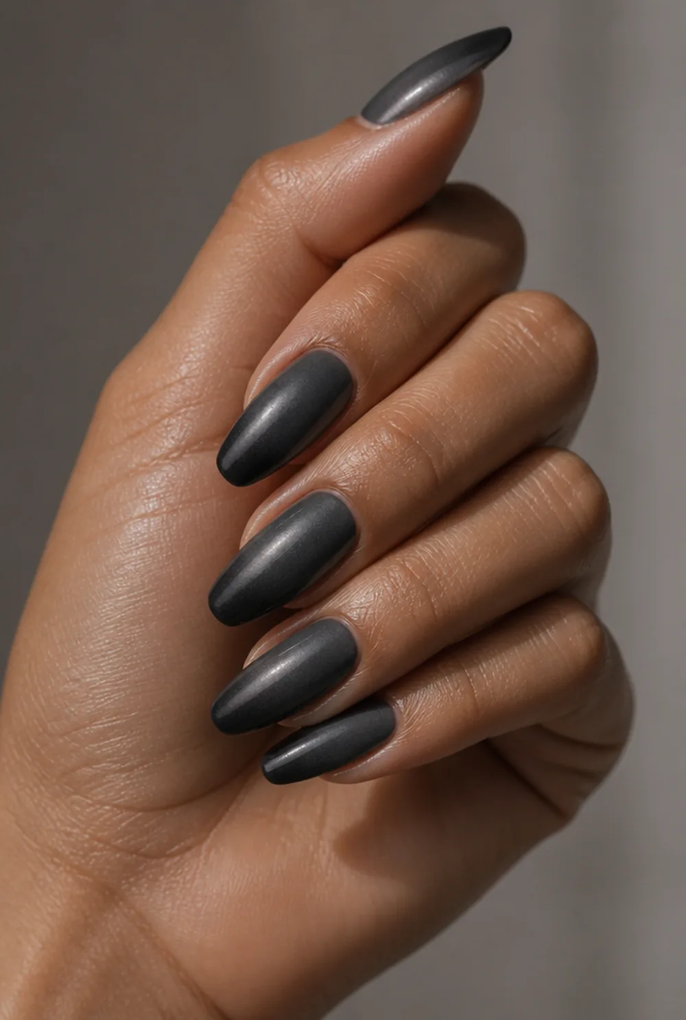 charcoal smoke nail art on olive skin, long length