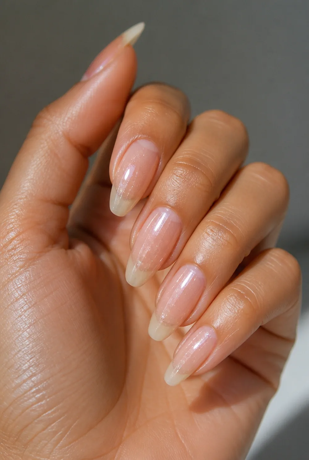 sheer sparkle topper nail art on olive skin, long length