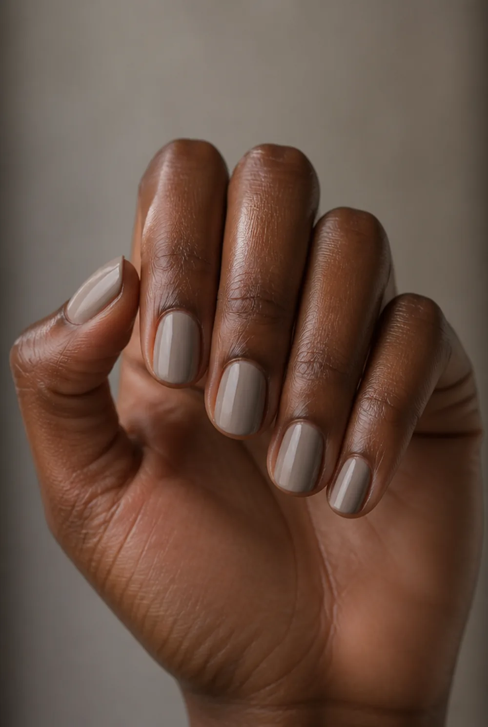 cool greige nail art on deep brown skin