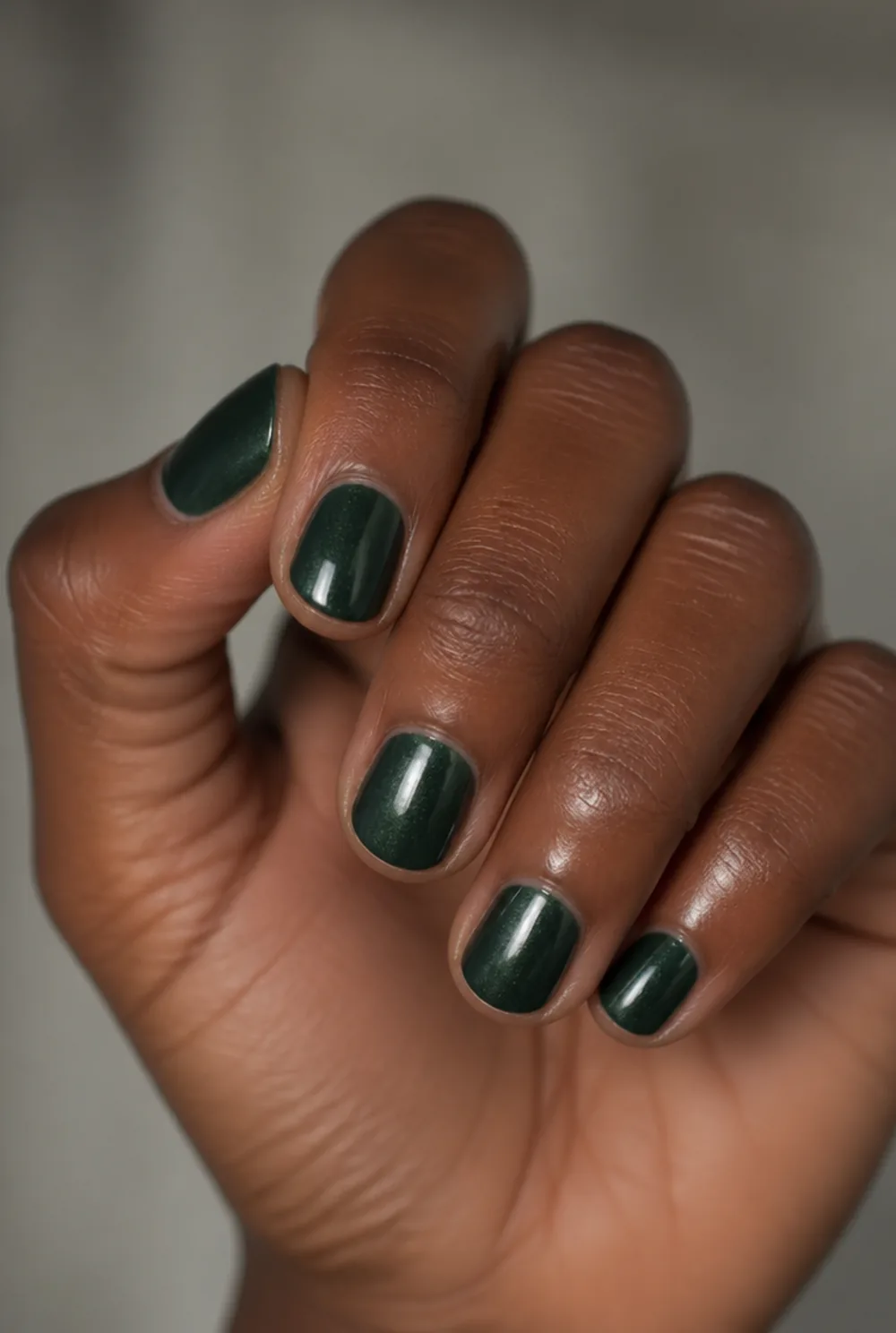 forest green nail art on deep brown skin