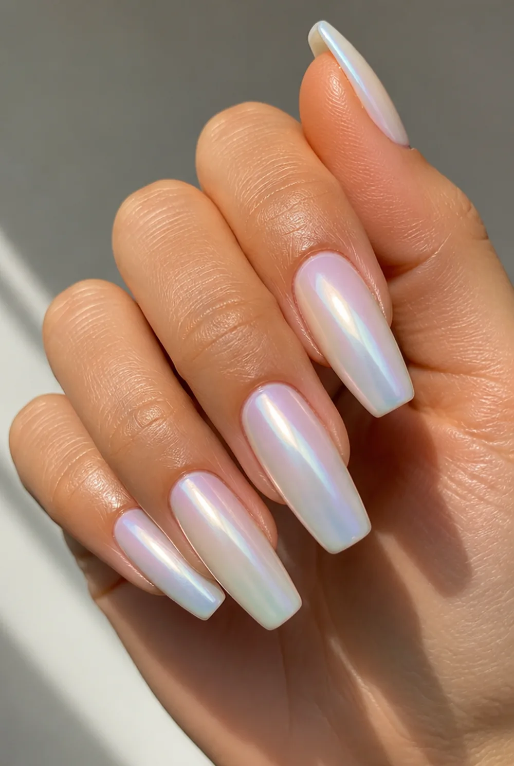 pearl glaze nail art on olive skin, long length