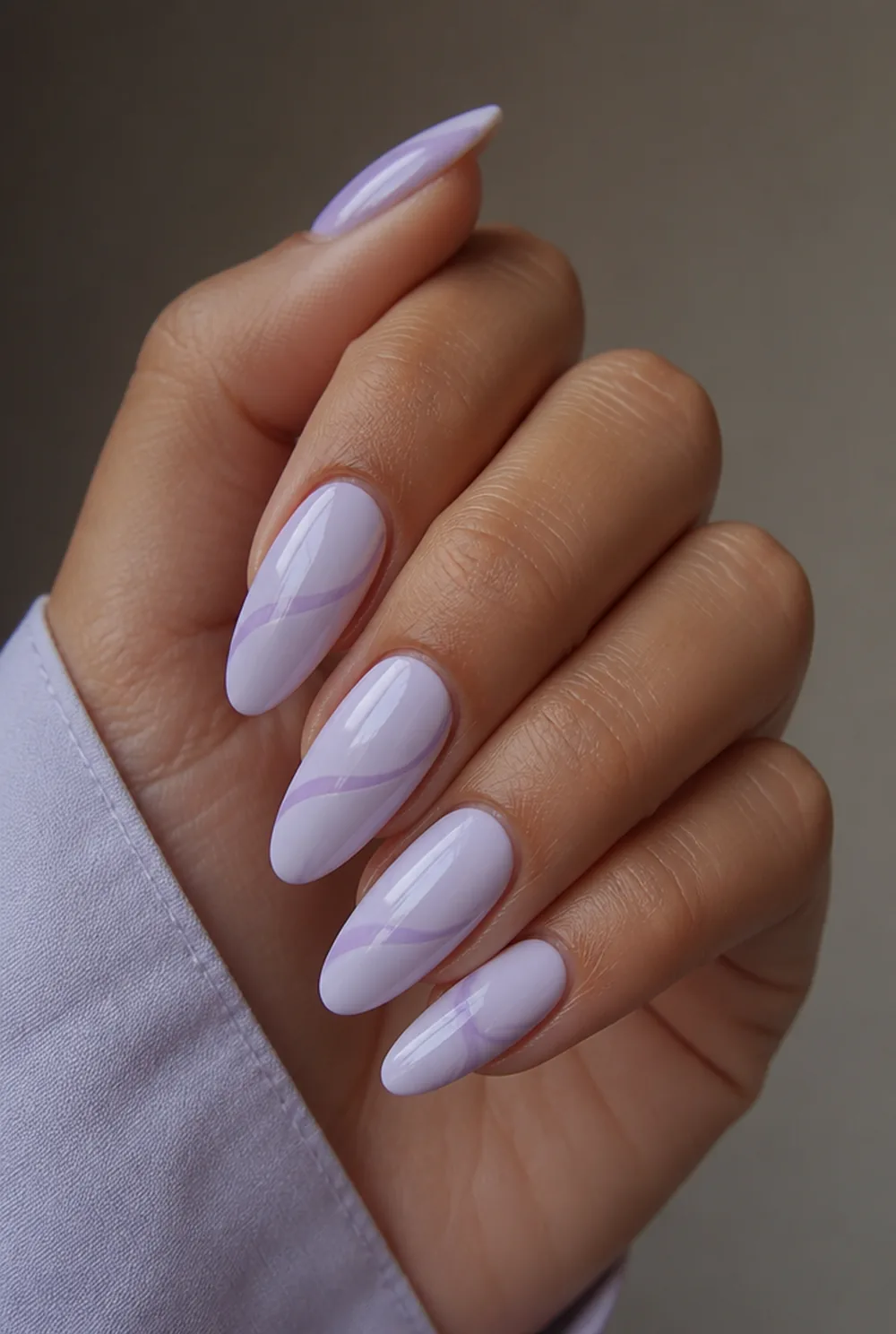lavender swirl nail art on olive skin, long length