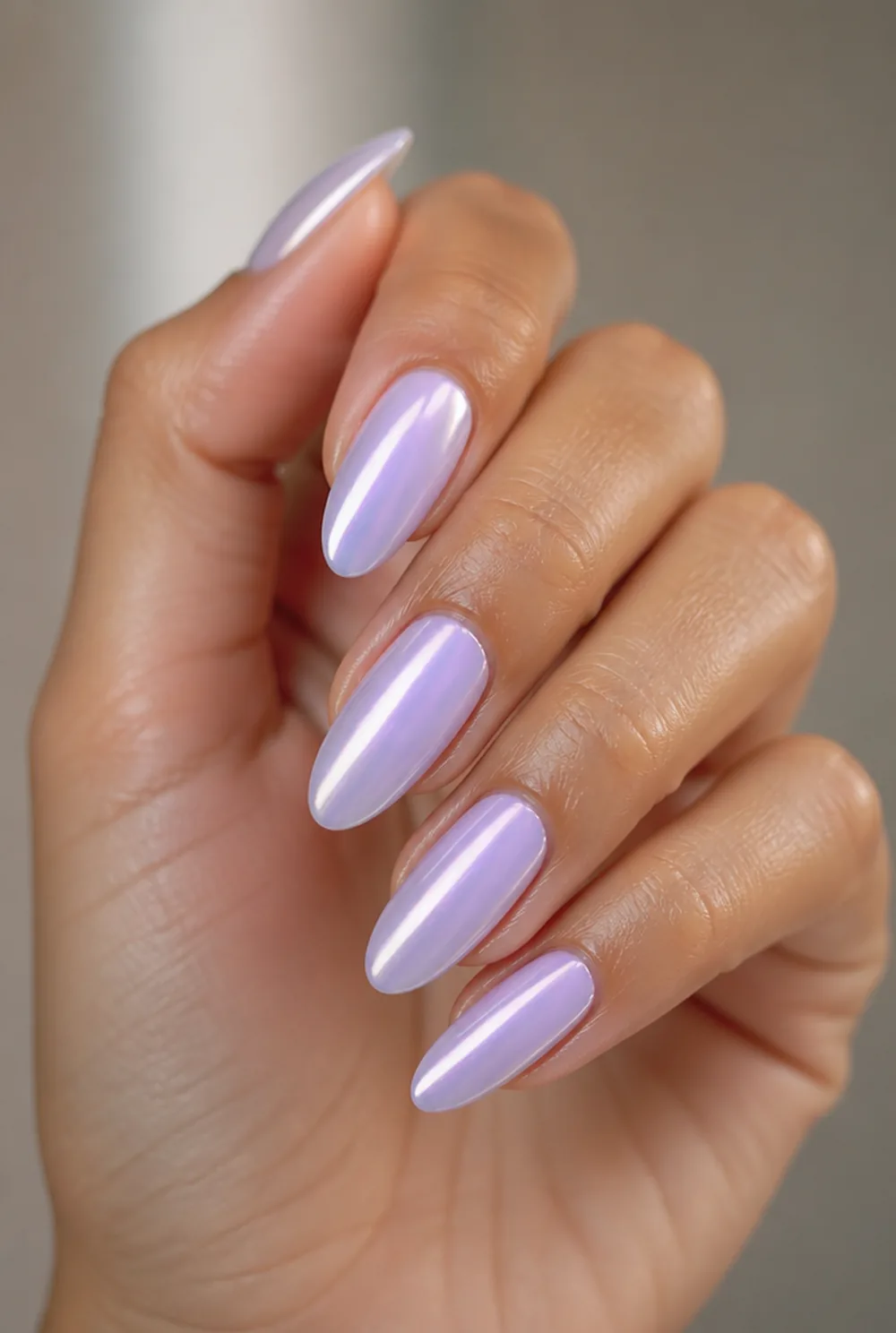 lavender glazed pearl nail art on olive skin, long length