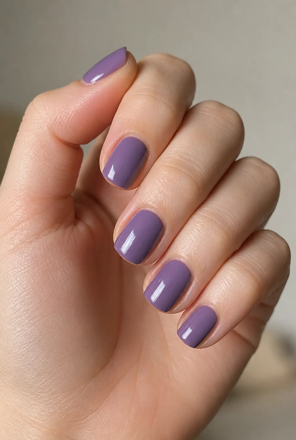 lavender creme nail art on fair skin, short length