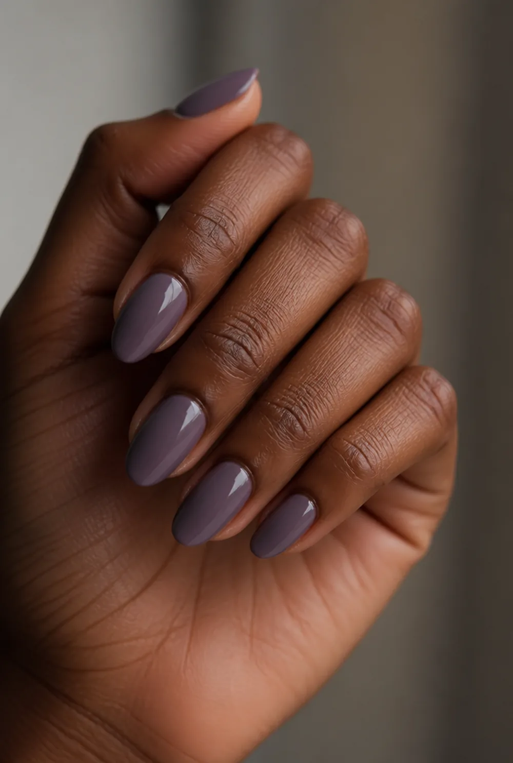 wisteria nail art on deep brown skin