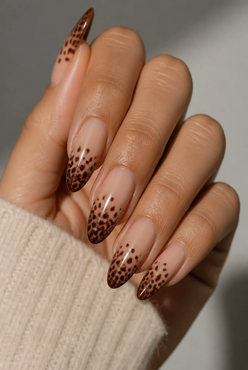 leopard ombre nail art on olive skin, long length