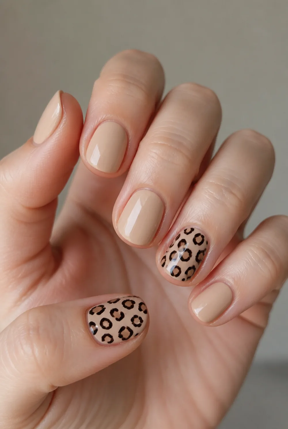 two accent nails only nail art on fair skin, short length