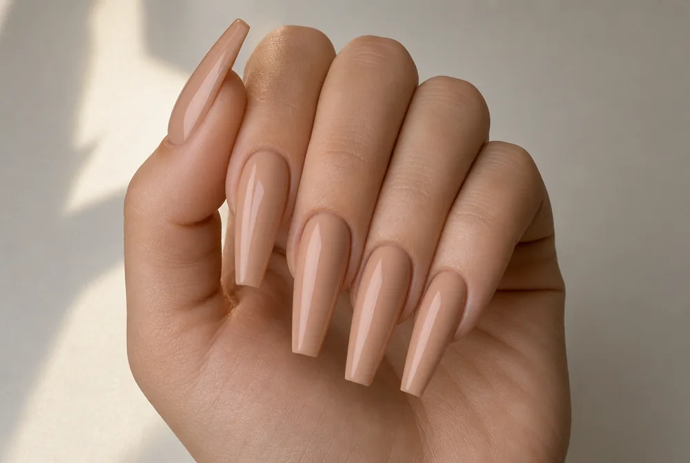 long nude coffin nails with glossy finish
