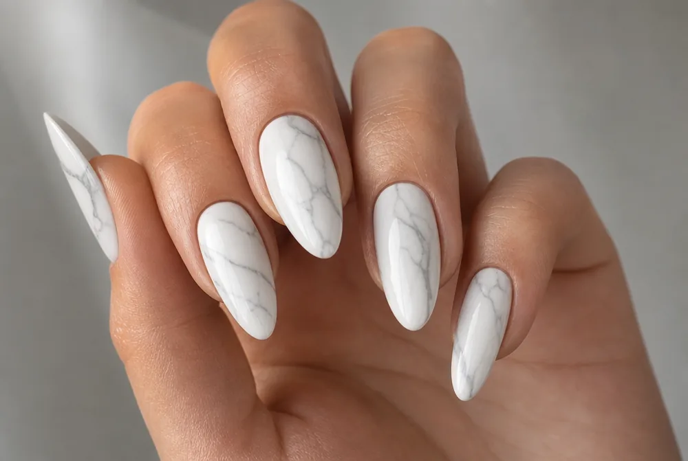 marble almond nails with gray veining