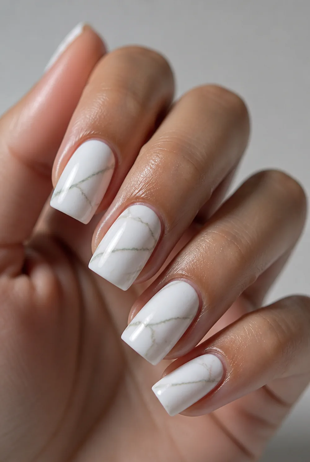 marble on short square nail art on olive skin, long length