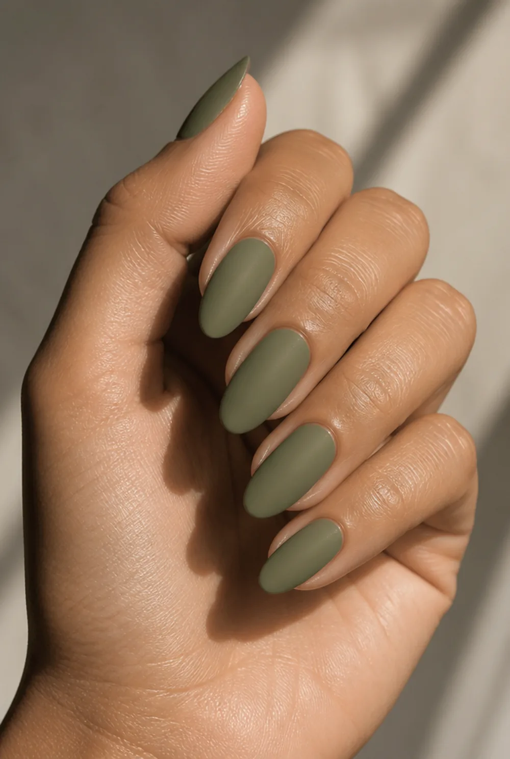 matte olive nail art on olive skin, long length