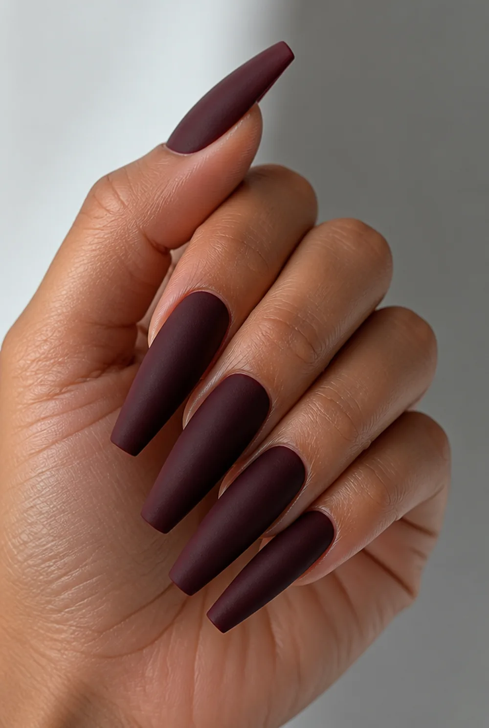 matte long coffin nail art on olive skin, long length