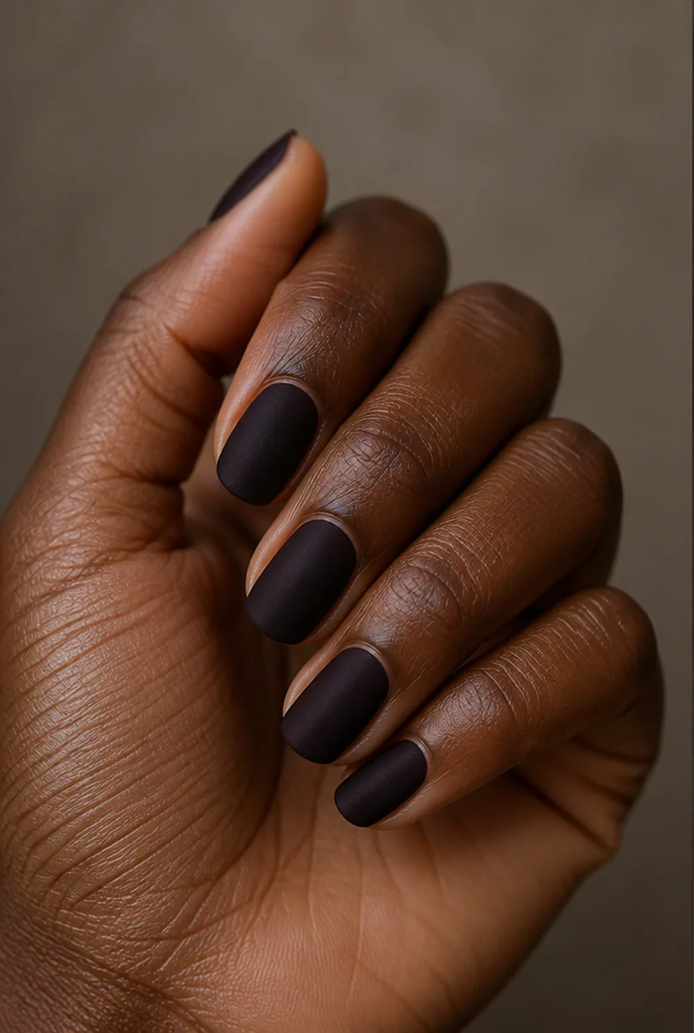 medium velvet matte nail art on deep brown skin
