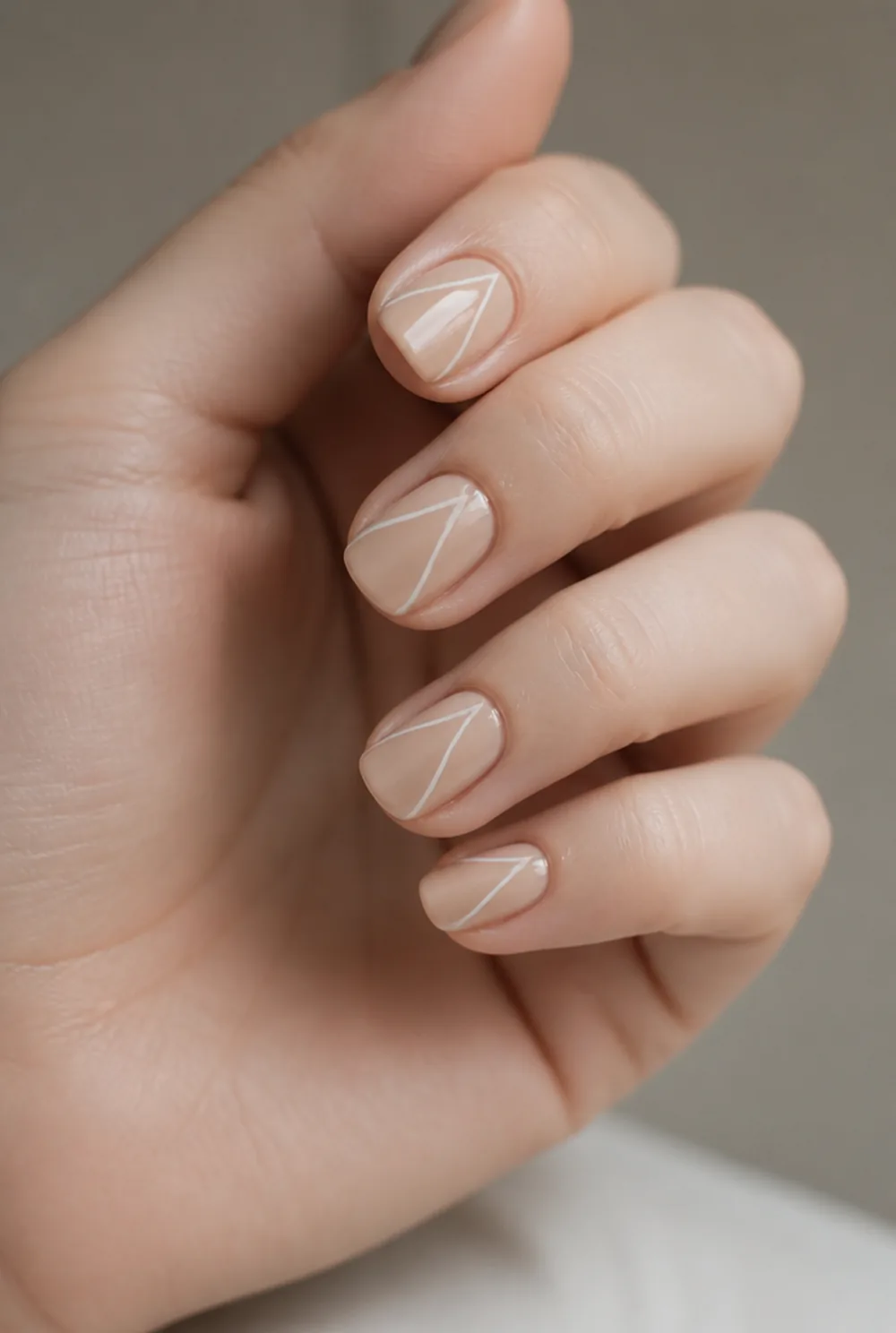 medium swirl nail art on fair skin, short length