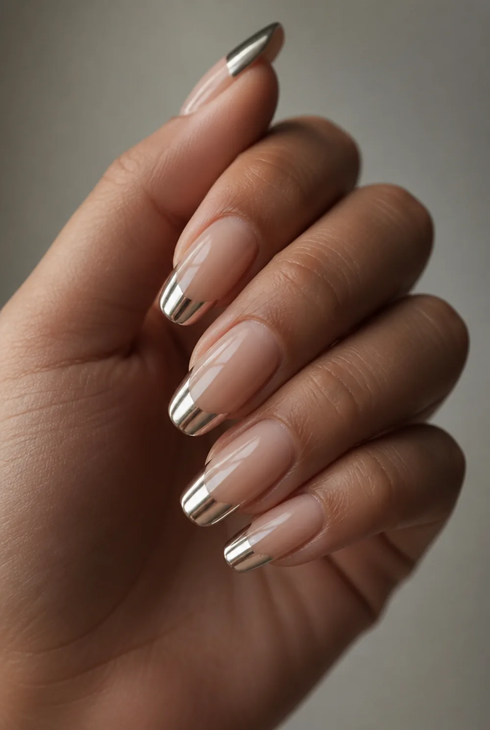 medium chrome tips nail art on olive skin, long length