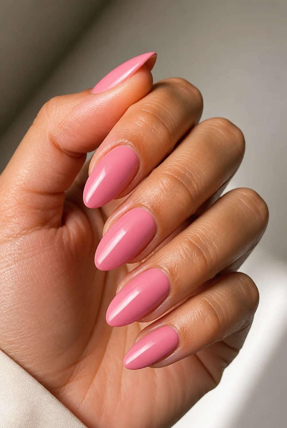 medium pink gloss nail art on olive skin, long length