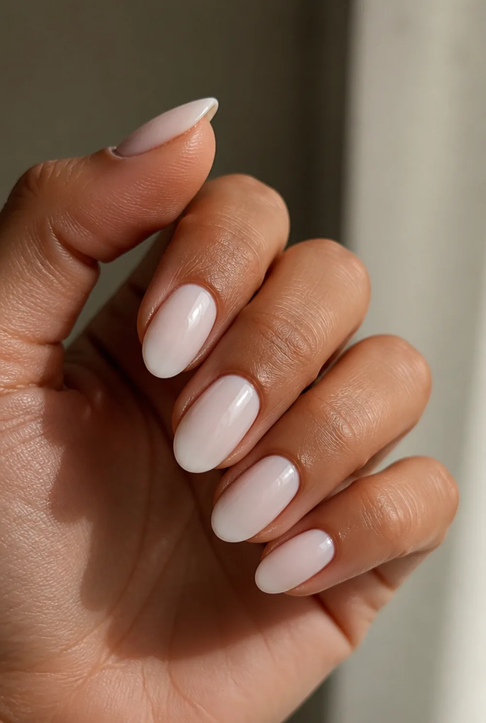 the plain milky wash nail art on olive skin, long length