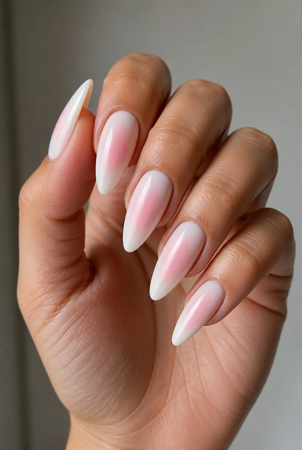 milky aura nail art on olive skin, long length