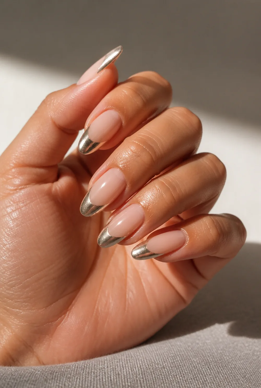 chrome tip only nail art on olive skin, long length