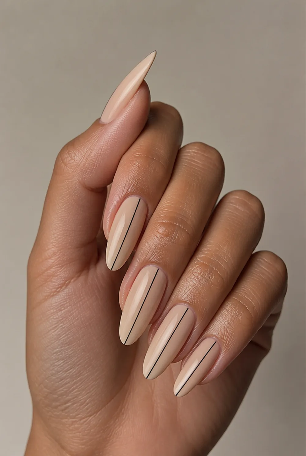 single line down nail art on olive skin, long length