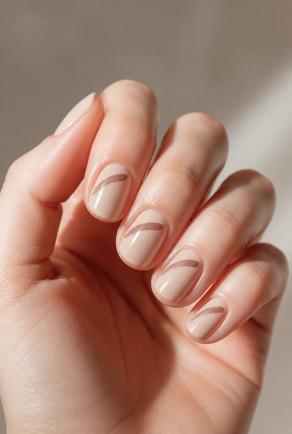 single swirl nail art on fair skin, short length