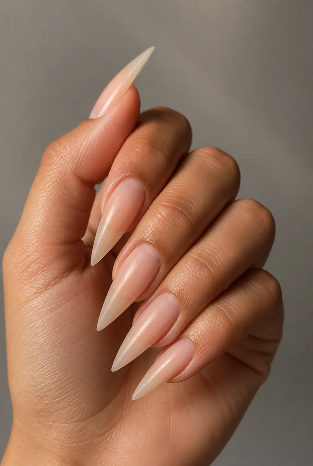 stiletto nail art on olive skin, long length