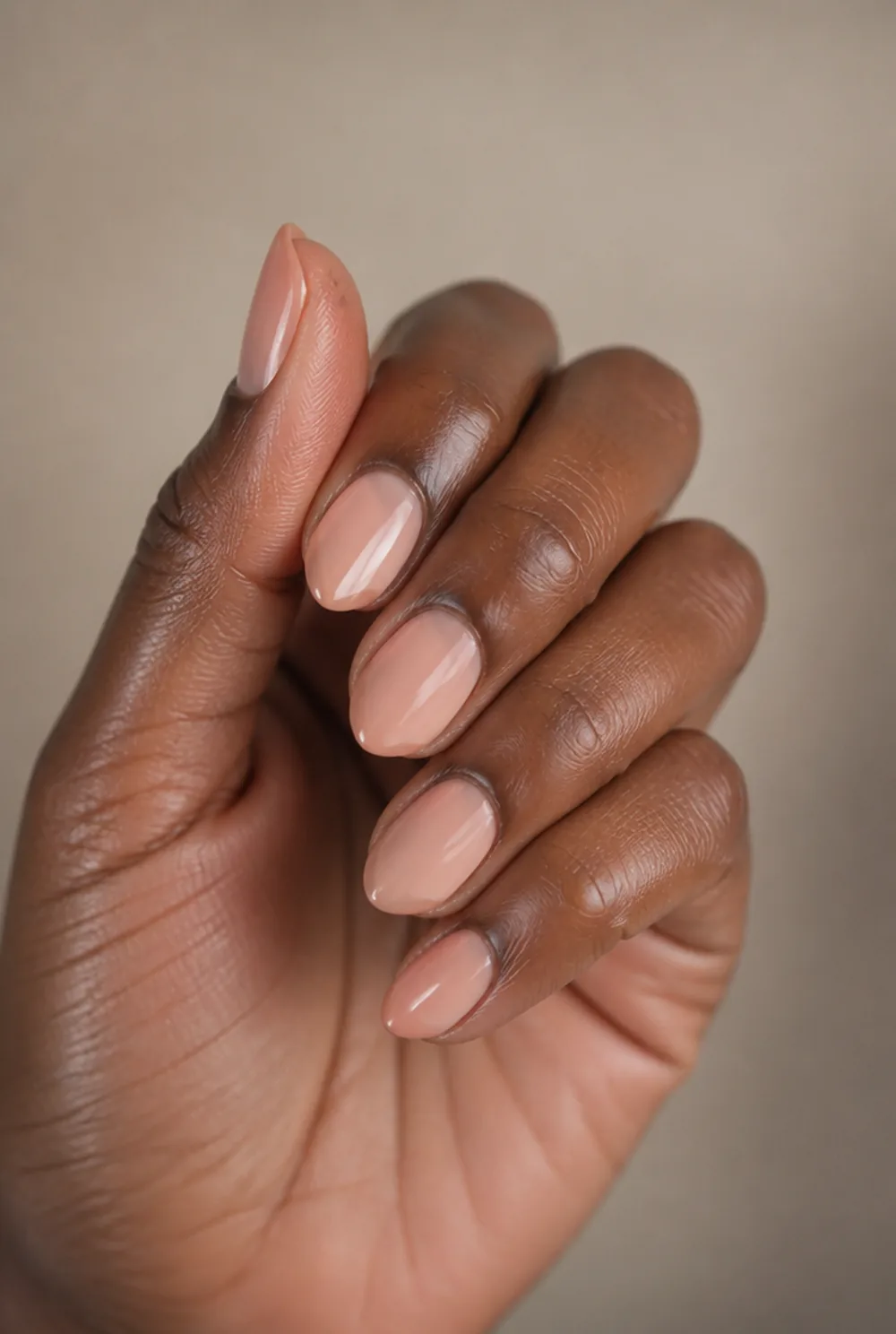 lipstick nail art on deep brown skin