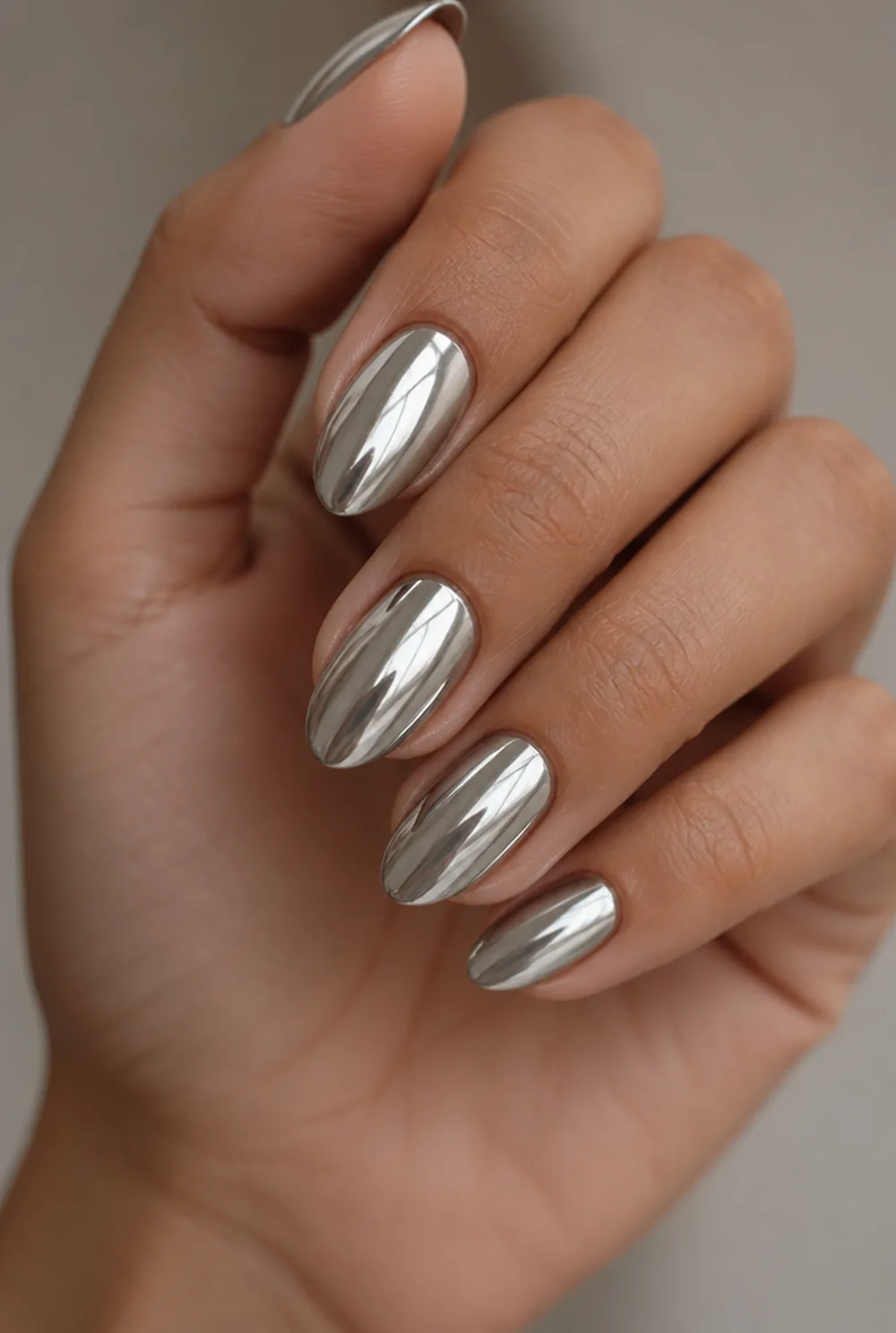 silver mirror chrome nail art on olive skin long length - PolishedAndPrettyNails.com silver mirror chrome nail art on olive skin, long length