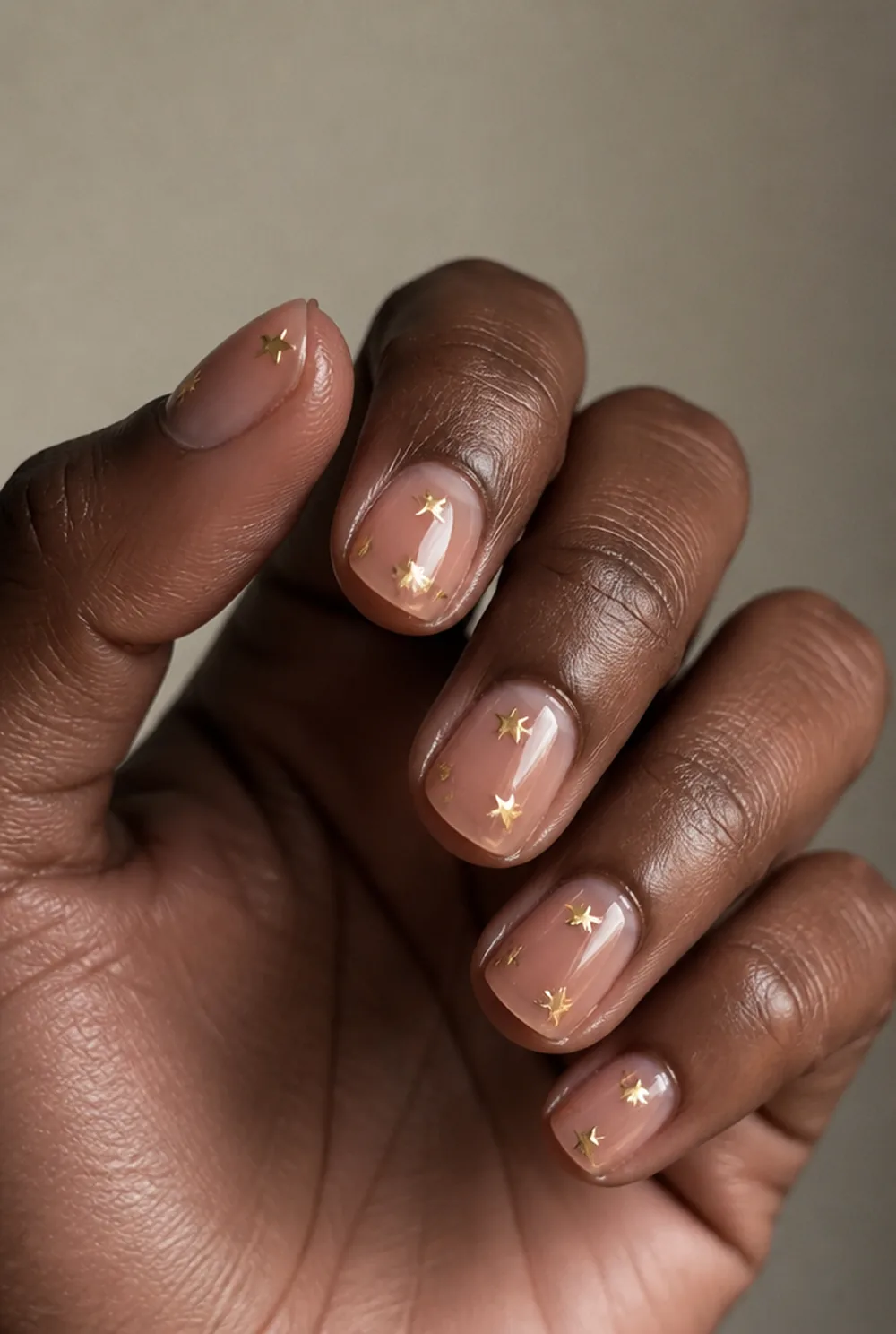 star confetti nail art on deep brown skin - PolishedAndPrettyNails.com star confetti nail art on deep brown skin