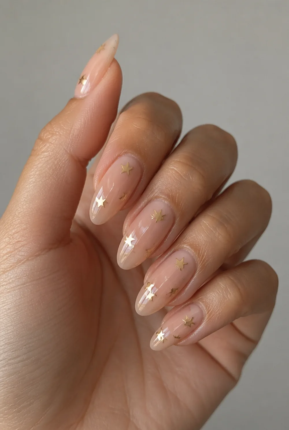 star confetti nail art on olive skin long length - PolishedAndPrettyNails.com star confetti nail art on olive skin, long length