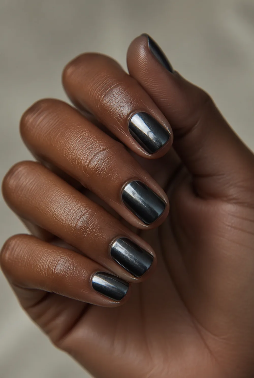 smoky gray chrome nail art on deep brown skin - PolishedAndPrettyNails.com smoky gray chrome nail art on deep brown skin