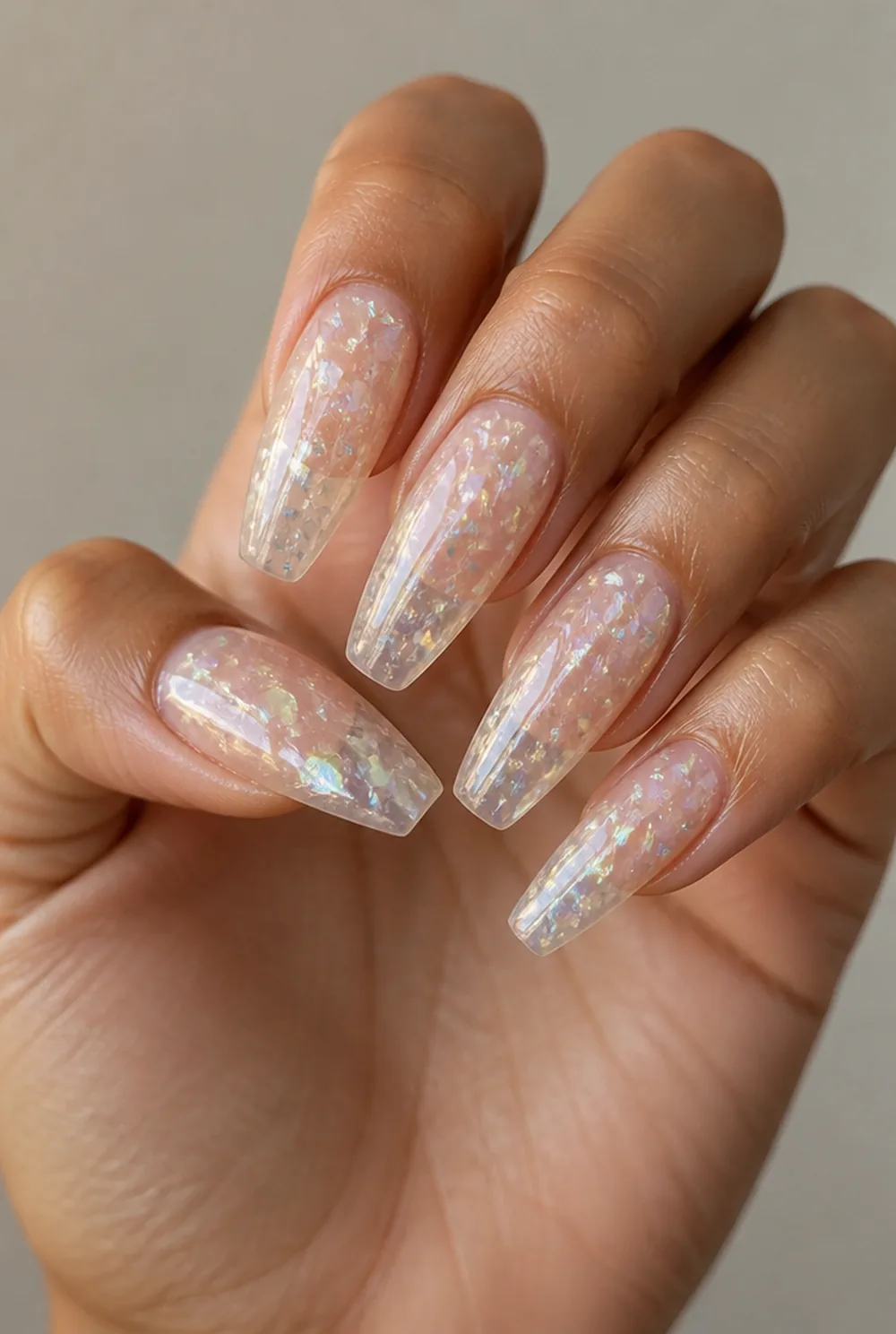 clear jelly with flakes nail art on olive skin long length - PolishedAndPrettyNails.com clear jelly with flakes nail art on olive skin, long length