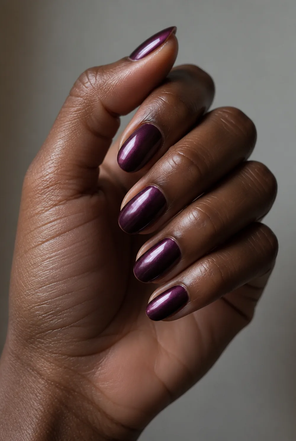 plum metallic nail art on deep brown skin - PolishedAndPrettyNails.com plum metallic nail art on deep brown skin