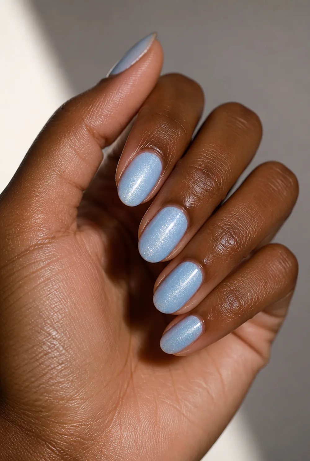 ice blue shimmer nail art on deep brown skin - PolishedAndPrettyNails.com ice blue shimmer nail art on deep brown skin