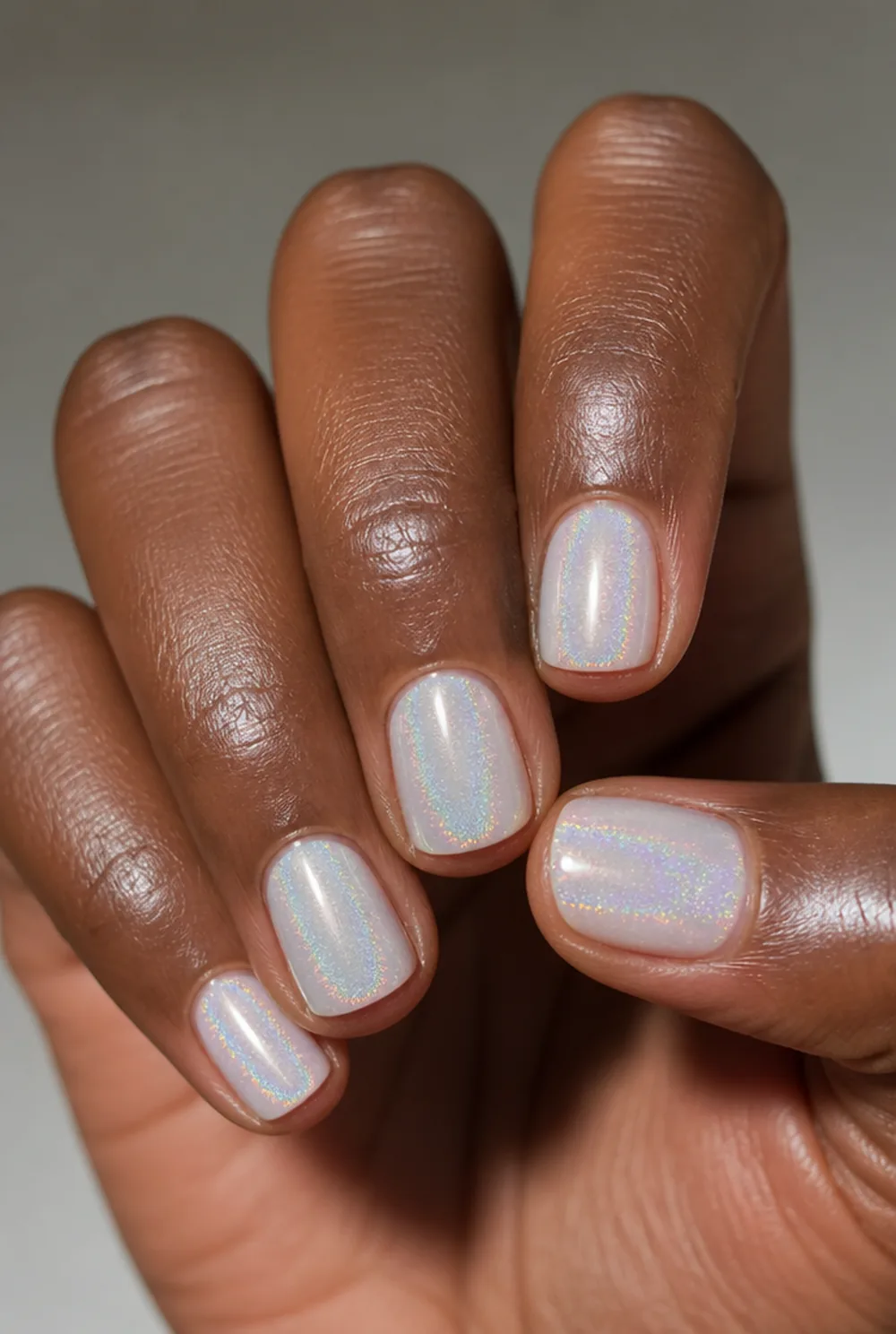 holographic top coat nail art on deep brown skin - PolishedAndPrettyNails.com holographic top coat nail art on deep brown skin