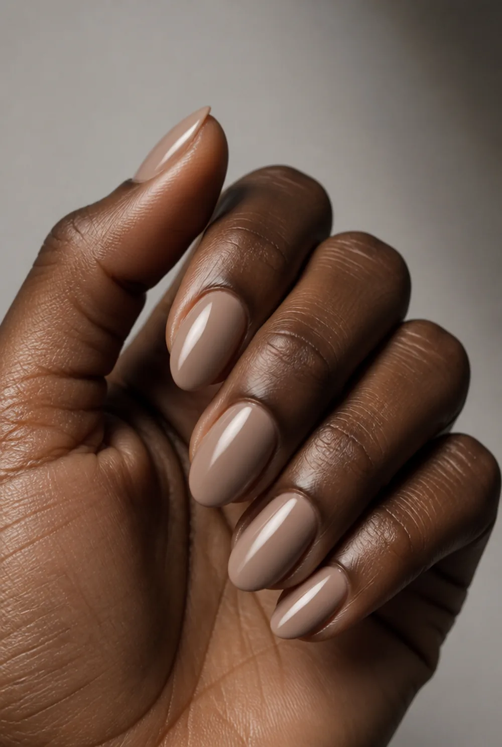 cashmere beige nail art on deep brown skin