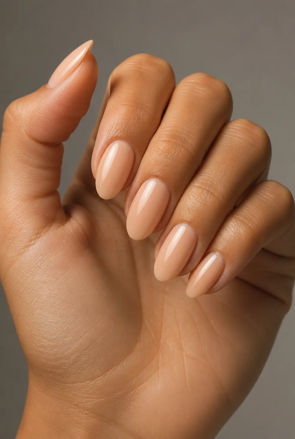 peachy nude nail art on olive skin, long length