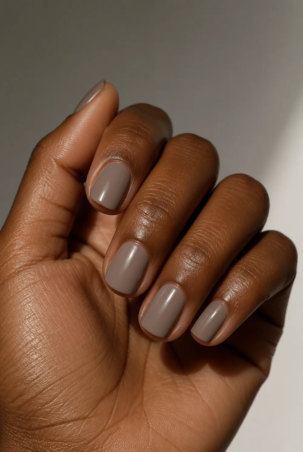 cool greige nail art on deep brown skin