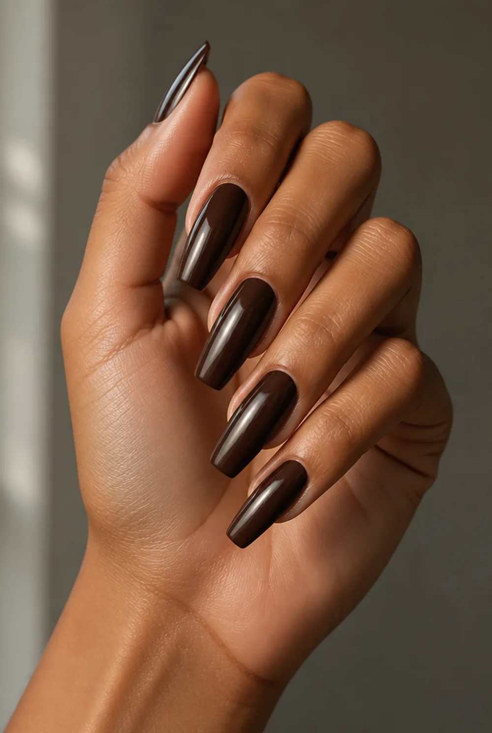 deep chocolate nude nail art on olive skin, long length