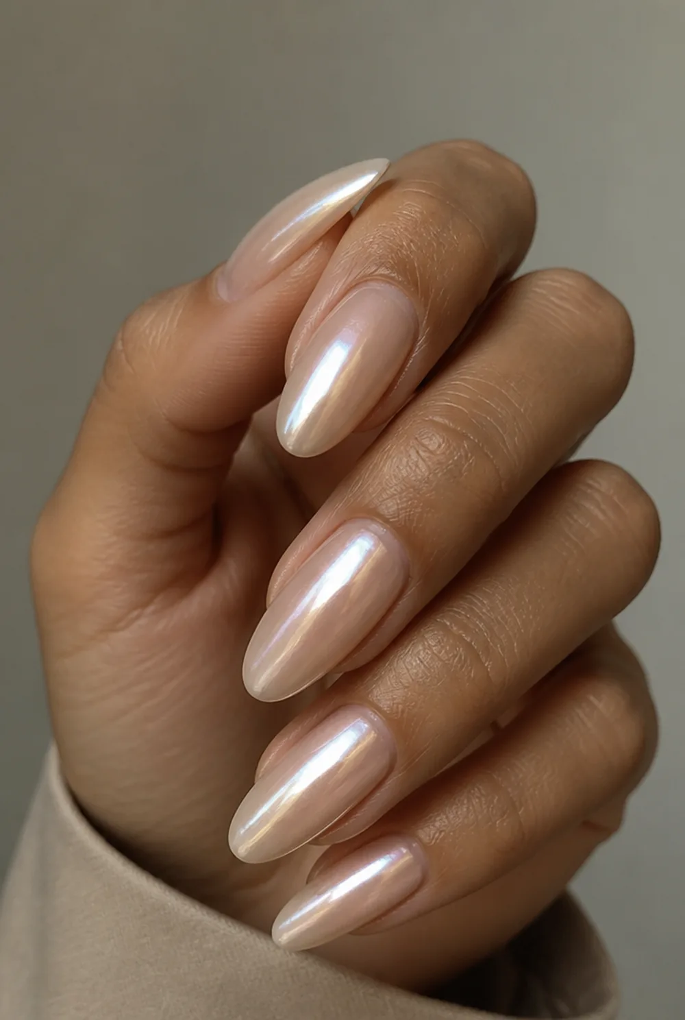 nude chrome nail art on olive skin, long length