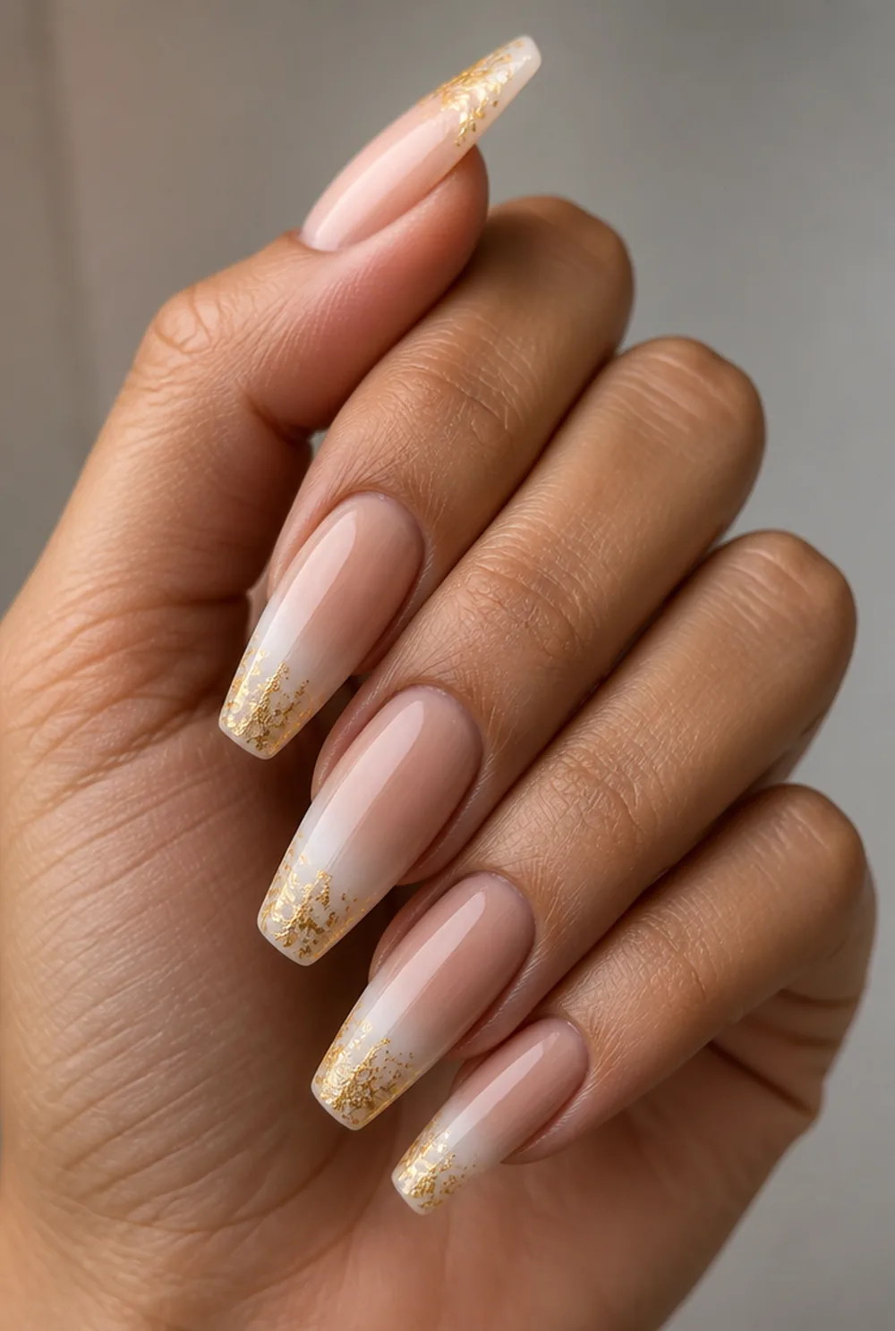ombre with foil flecks nail art on olive skin, long length