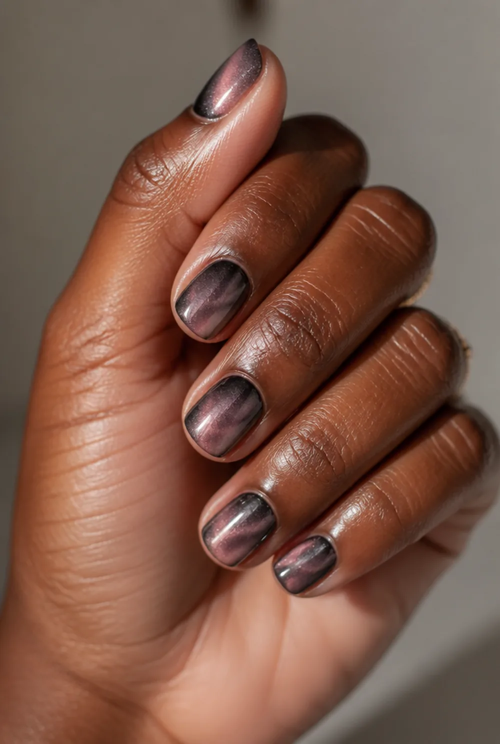 ombre cat eye nail art on deep brown skin