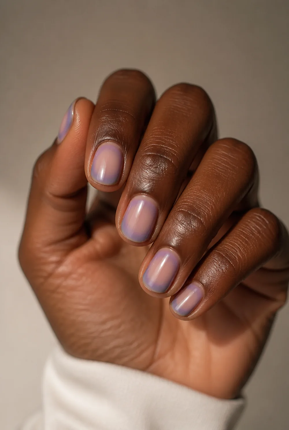 oval aura nails nail art on deep brown skin